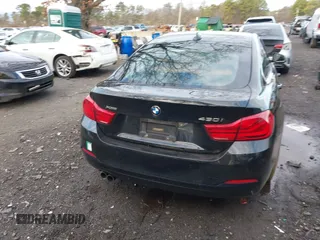 2018 BMW 4 Series 430i xDrive with VIN WBA4J3C56JBG91516, listed as a IAAI auction lot 41824273 with 102,932 mi miles and . Bid and sale history available at DreamBid. Image 16.