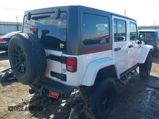 2017 Jeep Wrangler Unlimited Sahara with VIN 1C4BJWEG2HL552382, listed as a IAAI auction lot 41631092 with 96,097 mi miles and . Bid and sale history available at DreamBid. Image 4.