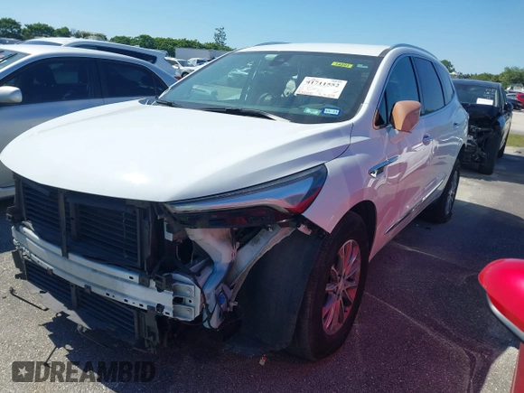 2022 Buick Enclave Essence with VIN 5GAERBKW7NJ189984, listed as a IAAI auction lot 41711552 with 83,295 mi miles. Bid and sale history available at carsss.com. Image 2.