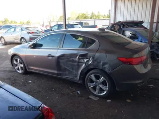 2014 Acura ILX Premium with VIN 19VDE1F51EE006621, listed as a IAAI auction lot 41984539 with 165,585 mi miles and . Bid and sale history available at DreamBid. Image 14.