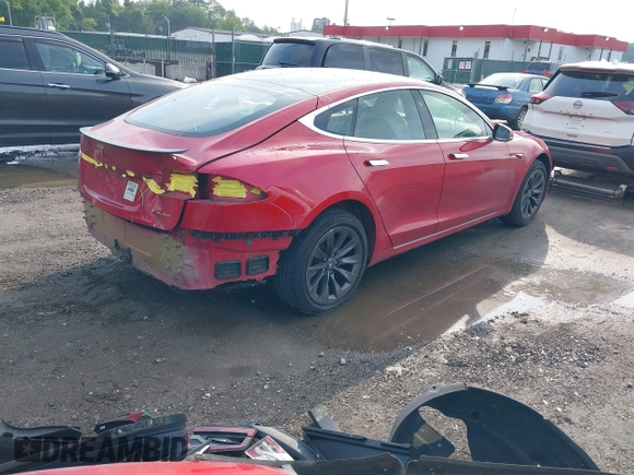 2020 Tesla Model S Long Range with VIN 5YJSA1E25LF396213, listed as a IAAI auction lot 42383231 with 73,125 mi miles and . Bid and sale history available at DreamBid. Image 4.