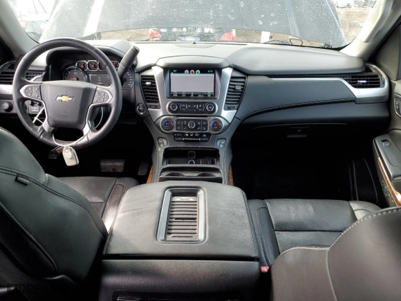 2015 Chevrolet Suburban LTZ with VIN 1GNSKKKCXFR722917, listed as a Copart auction lot 46176815 with 116,660 mi miles and Salvage Title. Bid and sale history available at carsss.com. Image 8.