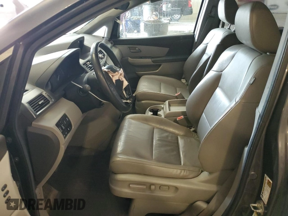 2012 Honda Odyssey Touring with VIN 5FNRL5H98CB028309, listed as a Copart auction lot 57663485 with 233,921 mi miles and Salvage title. Bid and sale history available at DreamBid. Image 7.