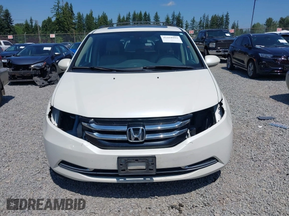2014 Honda Odyssey EX-L z VIN 5FNRL5H69EB088589, wystawiony jako IAAI lot #42418952 z przebiegiem 96 767 mil mil oraz . Historia ofert i sprzedaży dostępna na DreamBid. Obrazek 6.