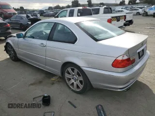 2003 BMW 3 Series 325Ci with VIN WBABN33453PG60668, listed as a Copart auction lot 42127385 with 155,189 mi miles and Salvage Title. Bid and sale history available at carsss.com. Image 2.