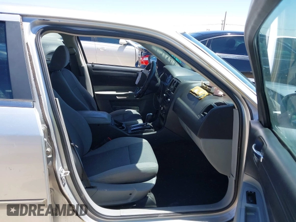 2007 Chrysler 300 with VIN 2C3KA43RX7H664582, listed as a IAAI auction lot 42106297 with 141,866 mi miles and . Bid and sale history available at DreamBid. Image 5.