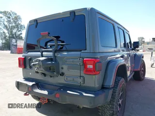 2019 Jeep Wrangler Unlimited Rubicon with VIN 1C4HJXFN6KW547401, listed as a IAAI auction lot 42250698 with 103,910 mi miles and . Bid and sale history available at DreamBid. Image 4.