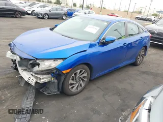 2017 Honda Civic Sedan EX with VIN 2HGFC2F72HH535812, listed as a IAAI auction lot 41894793 with 124,594 mi miles. Bid and sale history available at carsss.com. Image 2.