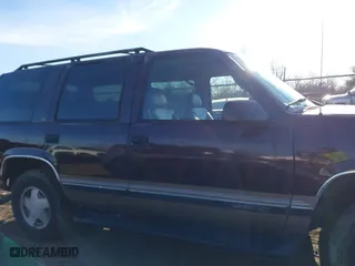 1996 Chevrolet Tahoe with VIN 1GNEK13R9TJ336722, listed as a IAAI auction lot 41576273 with 163,609 mi miles. Bid and sale history available at carsss.com. Image 14.
