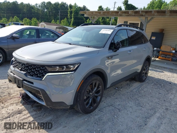 2022 Kia Sorento SX z VIN 5XYRKDLF8NG107713, wystawiony jako IAAI lot #42286802 z przebiegiem 53 718 mil mil oraz . Historia ofert i sprzedaży dostępna na DreamBid. Obrazek 2.
