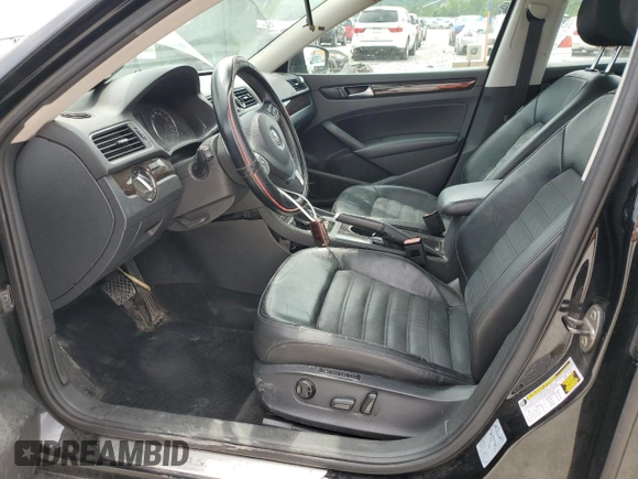 2014 Volkswagen Passat SEL Premium with VIN 1VWCN7A30EC036693, listed as a Copart auction lot 59156245 with 136,939 mi miles and Salvage title. Bid and sale history available at DreamBid. Image 7.
