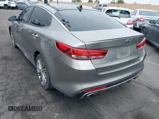 2017 Kia Optima SX Limited z VIN 5XXGV4L20HG169787, wystawiony jako IAAI lot #42194580 z przebiegiem 89 035 mil mil oraz . Historia ofert i sprzedaży dostępna na DreamBid. Obrazek 3.
