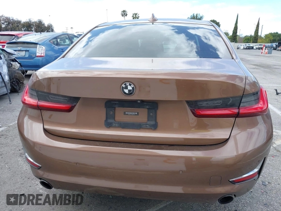 2019 BMW 3 Series 330i with VIN WBA5R1C57KAK07519, listed as a IAAI auction lot 42042379 with 40,898 mi miles and . Bid and sale history available at DreamBid. Image 16.