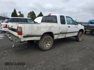 1997 Toyota T100 DX z VIN JT4UN22DXV0041578, wystawiony jako Copart lot #77388104 z przebiegiem 333 587 mil mil oraz Tytuł czysty. Historia ofert i sprzedaży dostępna na DreamBid. Obrazek 3.