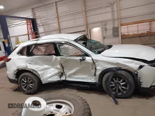 2016 Mazda CX-9 Touring with VIN JM3TCBCY3G0114707, listed as a IAAI auction lot 42023034 with 225,281 mi miles and . Bid and sale history available at DreamBid. Image 13.