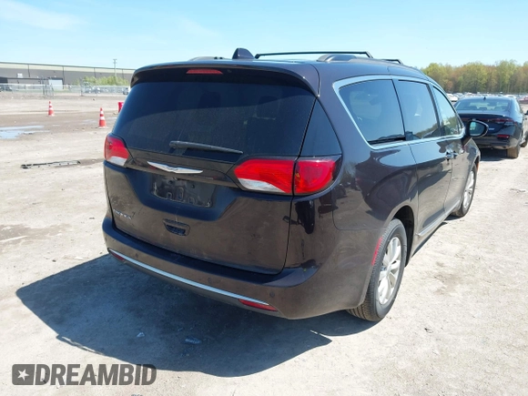 2017 Chrysler Pacifica Touring L with VIN 2C4RC1BG0HR747551, listed as a IAAI auction lot 42139664 with 120,057 mi miles and . Bid and sale history available at DreamBid. Image 4.