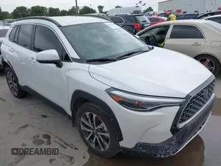 2022 Toyota Corolla Cross XLE with VIN 7MUEAAAG9NV036235, listed as a IAAI auction lot 42032668 with 23,074 mi miles and . Bid and sale history available at DreamBid. Image 1.