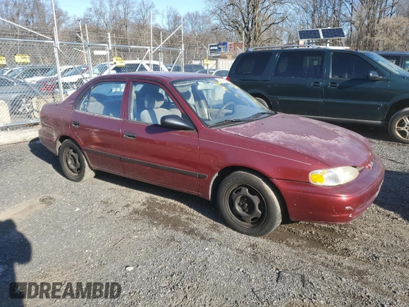 2000 Chevrolet Prizm z VIN 1Y1SK5285YZ414770, wystawiony jako Copart lot #84844584 z przebiegiem 112 174 mil mil oraz Szkoda całkowita • Salvage title. Historia ofert i sprzedaży dostępna na DreamBid. Obrazek 4.