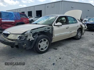 2001 Lincoln Continental z VIN 1LNHM97V91Y622267, wystawiony jako Copart lot #59915445 z przebiegiem 77 070 mil mil oraz Szkoda całkowita • Salvage title. Historia ofert i sprzedaży dostępna na DreamBid. Obrazek 1.