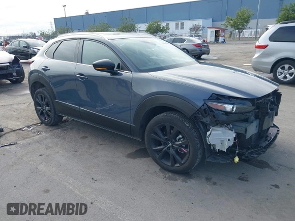 2023 Mazda CX-30 S Carbon Edition with VIN 3MVDMBCM7PM589019, listed as a IAAI auction lot 41251168 with 23,847 mi miles and . Bid and sale history available at DreamBid. Image 1.