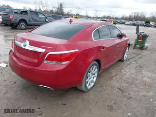 2012 Buick LaCrosse Touring with VIN 1G4GJ5E35CF318625, listed as a IAAI auction lot 40883410 with 92,845 mi miles. Bid and sale history available at carsss.com. Image 4.