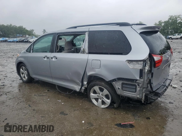 2015 Toyota Sienna LE AAS with VIN 5TDKK3DC5FS550258, listed as a Copart auction lot 58069915 with 138,260 mi miles and Salvage title. Bid and sale history available at DreamBid. Image 2.