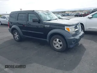 2007 Dodge Nitro SXT with VIN 1D8GT28K27W502900, listed as a IAAI auction lot 42077428 with 166,114 mi miles. Bid and sale history available at carsss.com. Image 1.