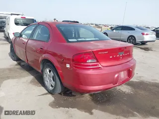 2003 Dodge Stratus SXT with VIN 1B3EL46X13N557744, listed as a IAAI auction lot 41689194 with 206,410 mi miles. Bid and sale history available at carsss.com. Image 3.