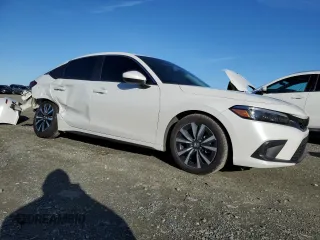 2024 Honda Civic EX-L z VIN 19XFL1H78RE019537, wystawiony jako Copart lot #87081334 z przebiegiem 19 662 mil mil oraz Szkoda całkowita • Salvage title. Historia ofert i sprzedaży dostępna na DreamBid. Obrazek 4.