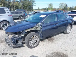 2014 Toyota Avalon Limited with VIN 4T1BK1EB3EU078237, listed as a IAAI auction lot 42033607 with 80,977 mi miles. Bid and sale history available at carsss.com. Image 2.