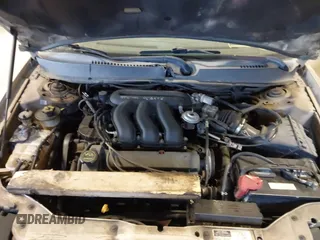 2001 Ford Taurus SES with VIN 1FAFP55S31A143202, listed as a IAAI auction lot 41950702 with 238,193 mi miles. Bid and sale history available at carsss.com. Image 10.