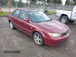 2003 Mazda Protege DX z VIN JM1BJ225830130106, wystawiony jako IAAI lot #41977502 z przebiegiem 132 390 mil mil oraz . Historia ofert i sprzedaży dostępna na DreamBid. Obrazek 1.