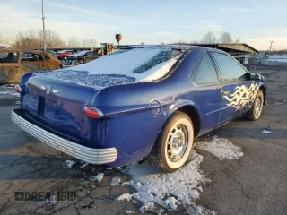 1995 Ford Thunderbird LX with VIN 1FALP62W4SH164066, listed as a Copart auction lot 86115924 with 92,990 mi miles and Salvage Title. Bid and sale history available at DreamBid. Image 3.