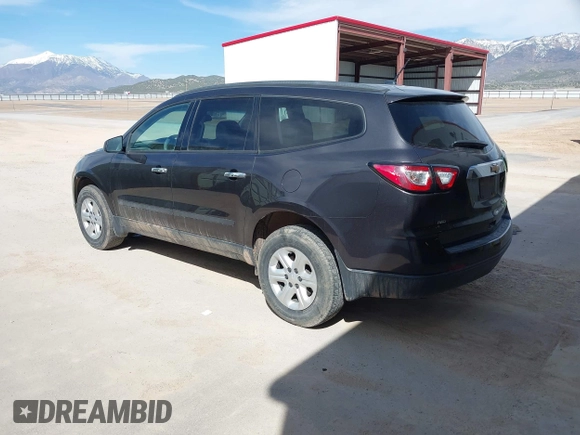 2015 Chevrolet Traverse LS z VIN 1GNKVFED4FJ323888, wystawiony jako IAAI lot #42001827 z przebiegiem 182 819 mil mil oraz . Historia ofert i sprzedaży dostępna na DreamBid. Obrazek 3.
