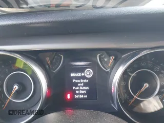 2019 Jeep Wrangler Unlimited Sport S с VIN 1C4HJXDNXKW521175, выставлен на аукционе IAAI как лот 41902053 с пробегом 56 184 миль миль и . История ставок и продаж доступна на DreamBid. Изображение 7.
