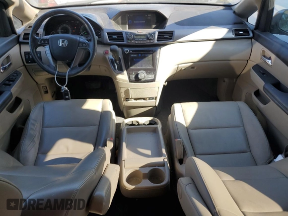 2014 Honda Odyssey EX-L with VIN 5FNRL5H61EB077828, listed as a Copart auction lot 46304125 with 104,367 mi miles and Salvage Title. Bid and sale history available at DreamBid. Image 8.