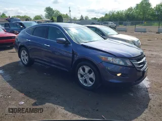 2012 Honda Crosstour EX-L z VIN 5J6TF2H50CL000259, wystawiony jako IAAI lot #42257263 z przebiegiem 169 538 mil mil oraz . Historia ofert i sprzedaży dostępna na DreamBid. Obrazek 1.
