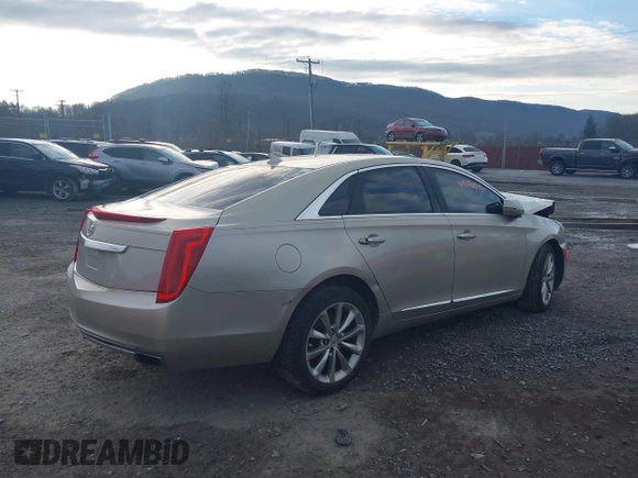 2014 Cadillac XTS Luxury z VIN 2G61M5S37E9304598, wystawiony jako IAAI lot #41006051 z przebiegiem 115 879 mil mil oraz . Historia ofert i sprzedaży dostępna na DreamBid. Obrazek 4.