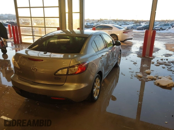 2010 Mazda Mazda3 i Touring with VIN JM1BL1SF6A1213814, listed as a IAAI auction lot 41230038 with 206,044 mi miles. Bid and sale history available at carsss.com. Image 4.