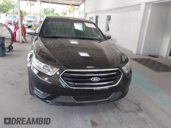 2017 Ford Taurus Limited z VIN 1FAHP2F81HG102598, wystawiony jako IAAI lot #42471410 z przebiegiem 165 386 mil mil oraz . Historia ofert i sprzedaży dostępna na DreamBid. Obrazek 13.
