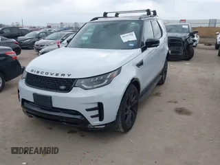 2017 Land Rover Discovery HSE with VIN SALRRBBV0HA041602, listed as a IAAI auction lot 41337528 with 104,411 mi miles and . Bid and sale history available at DreamBid. Image 2.