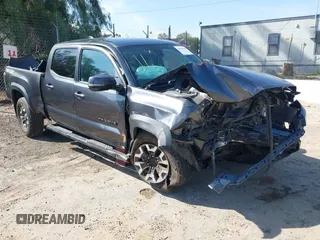 2021 Toyota Tacoma SR5 z VIN 3TMDZ5BN8MM117163, wystawiony jako IAAI lot #42070540 z przebiegiem 12 790 mil mil oraz . Historia ofert i sprzedaży dostępna na DreamBid. Obrazek 1.