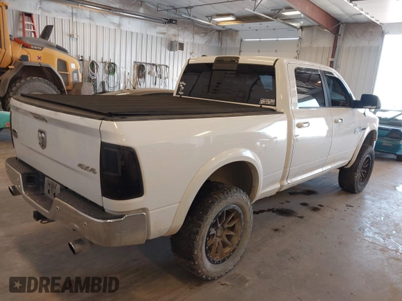 2015 Ram 1500 Laramie Limited with VIN 1C6RR7WM6FS678840, listed as a IAAI auction lot 42040449 with Not provided miles and . Bid and sale history available at DreamBid. Image 4.