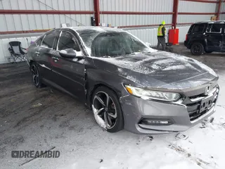 2018 Honda Accord Sedan Sport 1.5T with VIN 1HGCV1F31JA087538, listed as a IAAI auction lot 41479031 with 131,159 mi miles. Bid and sale history available at carsss.com. Image 1.
