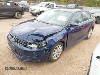 2013 Volkswagen Jetta Sedan SE w/Convenience/Sunroof with VIN 3VWBP7AJ3DM357905, listed as a IAAI auction lot 42065633 with 124,015 mi miles. Bid and sale history available at carsss.com. Image 2.