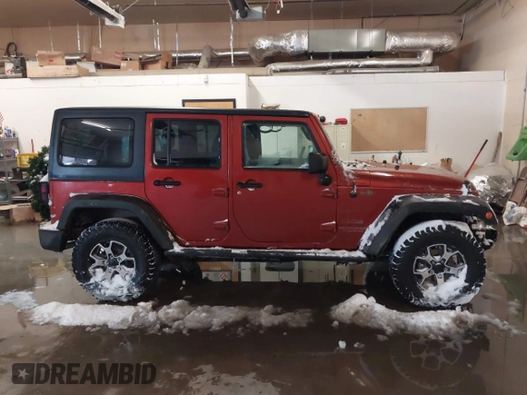 2014 Jeep Wrangler Unlimited Sport with VIN 1C4BJWDG6EL194569, listed as a IAAI auction lot 41549268 with 122,740 mi miles. Bid and sale history available at carsss.com. Image 14.