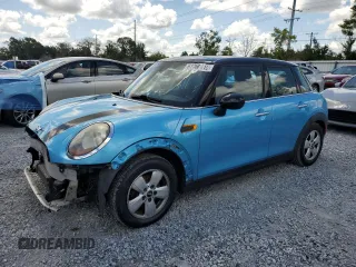 2016 MINI Hardtop 4 Door with VIN WMWXU1C52G2D08396, listed as a Copart auction lot 61060415 with 138,903 mi miles and Salvage title. Bid and sale history available at DreamBid. Image 1.