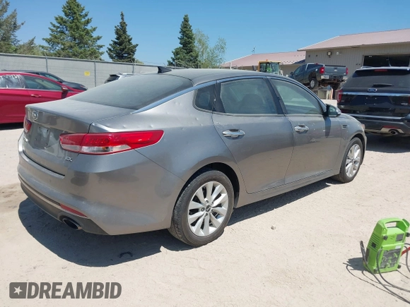 2017 Kia Optima EX with VIN 5XXGU4L38HG142560, listed as a IAAI auction lot 42167391 with 61,015 mi miles and . Bid and sale history available at DreamBid. Image 4.