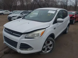 2014 Ford Escape SE with VIN 1FMCU9G93EUD37963, listed as a IAAI auction lot 41178797 with 171,149 mi miles and . Bid and sale history available at DreamBid. Image 2.