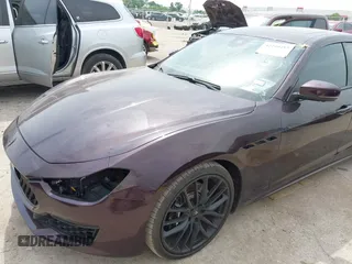 2019 Maserati Ghibli z VIN ZAM57YSL8K1312731, wystawiony jako IAAI lot #42240495 z przebiegiem 31 822 mil mil oraz . Historia ofert i sprzedaży dostępna na DreamBid. Obrazek 6.